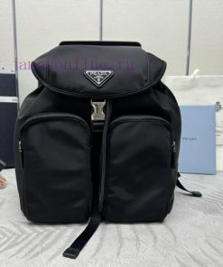 Upgraded version of the popular nylon backpack 1BZ005, featuring a classic triangular enamels7rqodpm