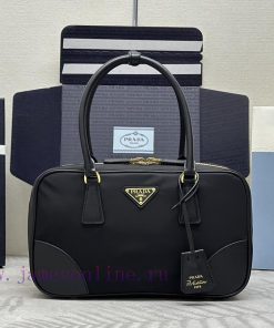 New vintage bag 1BB115 medium sizeThis dual handle handbag is made of recycled nylon, incorp43szgbx6