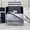The 2022 spring mini nylon shoulder bag 1BD313 mix and match concept runs through Prada's naych0fswg