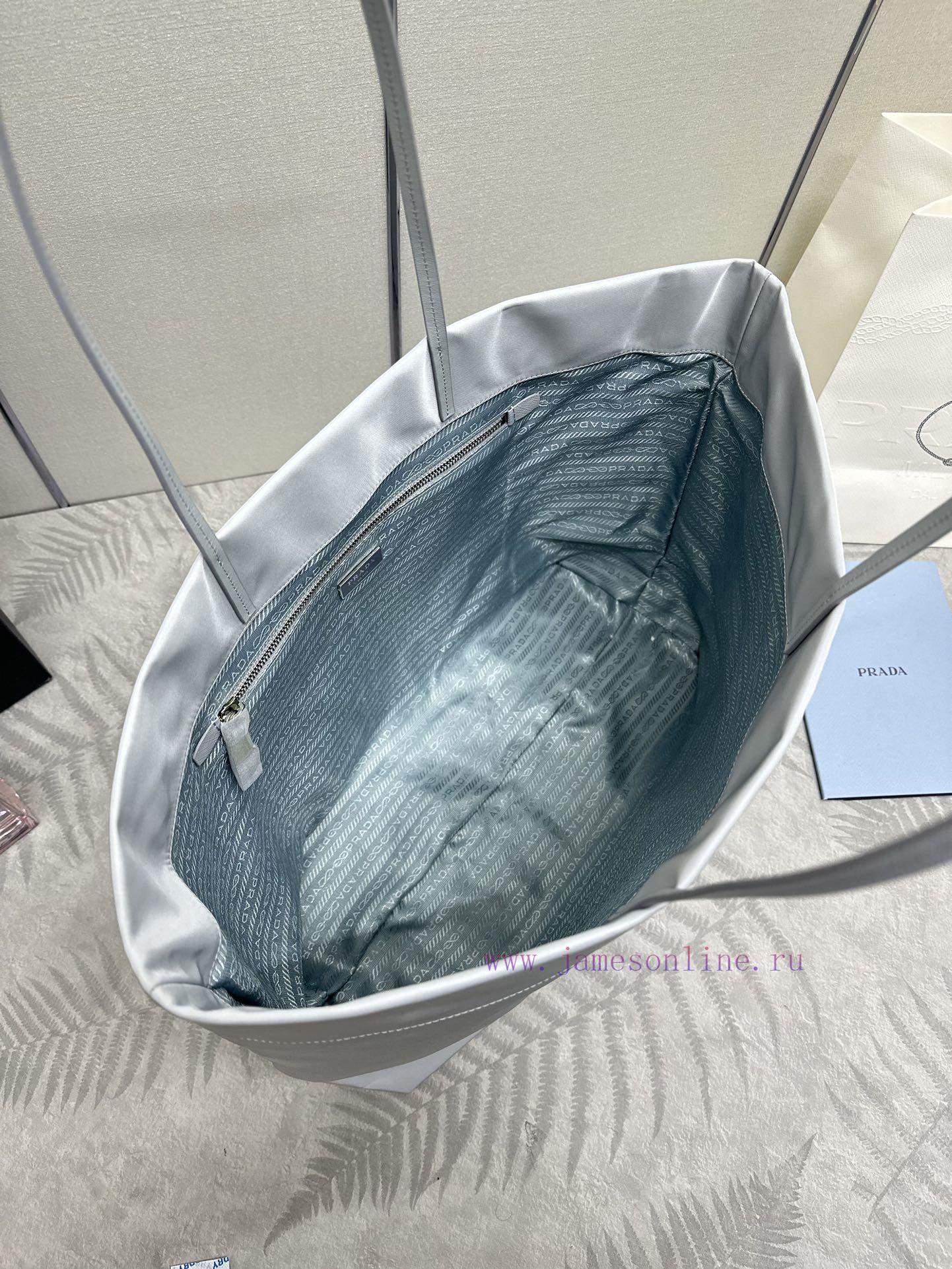 The new shopping bag 1BG107 is a medium-sized tote bag made of innovative recycled nylon fabdj54zvxb - Image 8