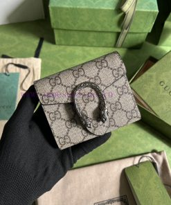Gucci The Dionysus collection features a super double G pattern and a super mini handbag. Th bs03pge1