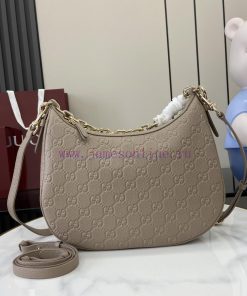 Gucci New GG Emblem Series Medium Shoulder BackpackThe new GG Emblem series reinterprets the 9fghl1f5