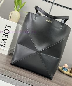 Loewe Bags . L ⊚℮ W ℮ The New Small Glossy Cowhide Puzzle Fold Tote Features The Iconic Geometric Lines Of go82w69q