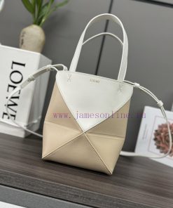 Loewe Bags . L ⊚℮ W ℮ The New Mini Two Tone Shiny Cowhide Puzzle Fold Handbag Draws Inspiration From The G 4adzf3on