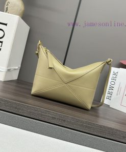 Loewe Bags . L ⊚℮ W ℮ The New Puzzle Fold Pouch Handbag Reinterprets A Practical And Versatile Handbag Dra vdgfp2jv